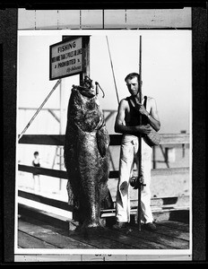 Portrait of a man with an extremely large fish