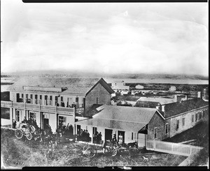 Exterior view of the Exchange Building in the community of Wilmington before the arrival of the railroad, Los Angeles, 1863