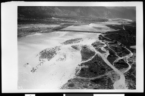 Flooded San Gabriel River looking northwest in Azusa, 1938