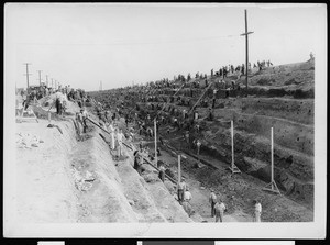 View of a trench excavation by a W.P.A. force for the Slauson Avenue Storm Drain outlet, looking east from Monier Lane, December 26, 1935