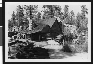 Exterior view of the wooden mill which was used in filming "The Trial of the Lonesome Pine" at Bartlett's Cedar Lake, ca.1950