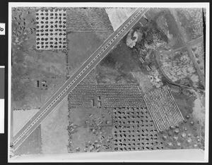 Close-up of a model of a camouflaged military installation and runway during World War II, ca.1939