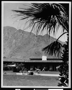 Palm Springs resort, showing people around a pool, ca.1940