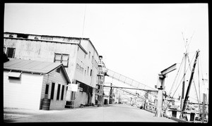 Exterior view of a cannery building at Fish Harbor in San Pedro, 1954