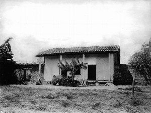 Restored adobe in California (or Nevada?) showing an attached gardener's house at left