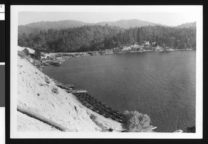 Boats lined up near the banks of Lake Arrowhead, ca.1950