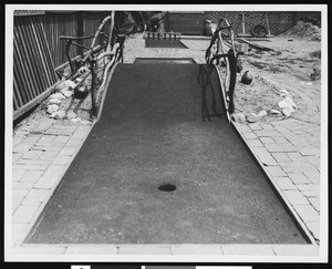 A hole on a miniature golf course, ca.1930