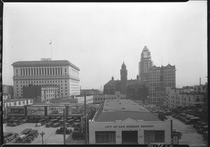 View of the Los Angeles civic center with the city garage in the foreground, 1927