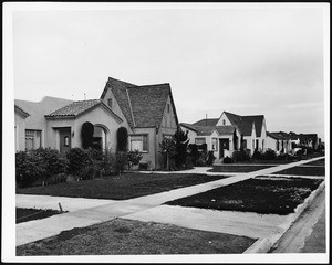 Unidentified street with small Spanish Colonial homes