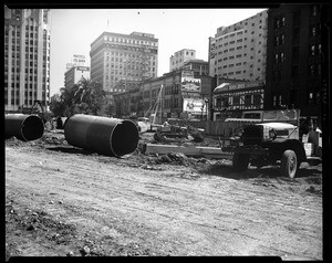 Bulldozer at work on the Pershing Square parking garage in Los Angeles, 1951