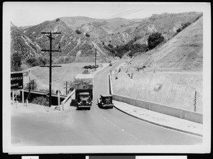 Automobiles crossing Tunnel Street Bridge over the Southern Pacific Railway tracks, January 16, 1935