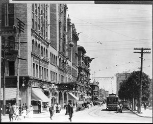 View of Fifth Street looking east from Olive Street, with the Philharmonic Auditorium Building on the left, ca.1910