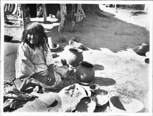 Pima Indian woman, Si-Rup, with her "Ollas", or water jugs, in Pima, Arizona, 1904