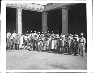 A group of about forty-four women and children Yaqui Indian prisoners under guard, Mexico, ca.1910