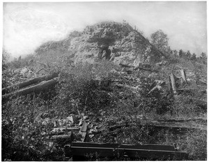 Barker the Black Hills Hermit at his cave, ca.1900