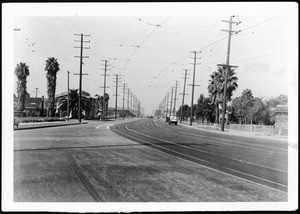 View of Venice Boulevard looking west from Seventh Avenue, showing newly-paved 95-foot street, ca.1930-1960