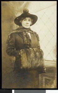 Portrait of a woman wearing fur