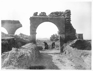 Two neophytes at work on reconstruction of Mission San Luis Rey, 1904