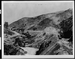 Early view of Cahuenga Pass, showing horse-drawn wagons