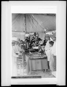 Gamblers playing roulette in a tent, Mexico City, Mexico, ca.1905