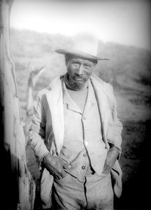 Yaqui Indian man in turtle-neck sweater, vest, and jacket, Arizona, ca.1910