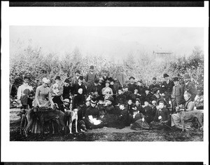 Group portrait of members of the Valley Hunt Club of Pasadena posing with dogs, ca.1888