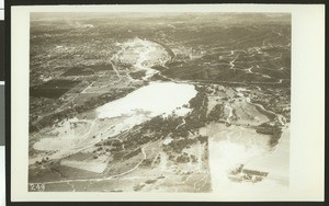 Aerial view of flooding near the Devil Gate Dam, ca.1930