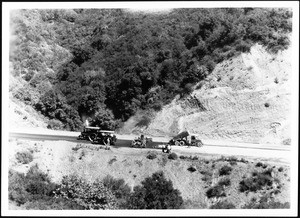 Sepulveda Boulevard one-half mile south of tunnel, showing operation in laying pavement with mechanical spreader, September 16, 1935