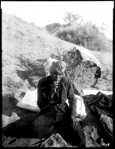 Juin, a Yuma Indian, Colorado River boatman, and interpreter during a trip of George Wharton James on the river, ca.1900