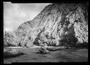 Large rocky cliff along border of ocean, Catalina, November 11, 1927