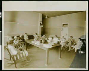 People seated in the sitting room in Ward 290 of the Los Angeles County General Hospital, ca.1925