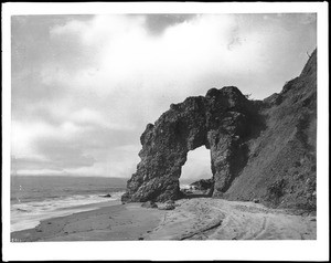 Old stage road through Arch Rock on Santa Monica Beach, looking north, ca.1895