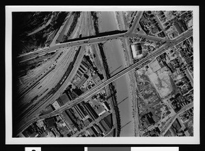 Aerial view of two streets over a river in Los Angeles