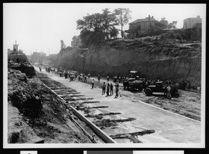 Slauson Avenue storm drain construction, showing automobiles at center