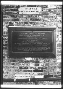 Commemorative plaque on an oil refinery in Newhall