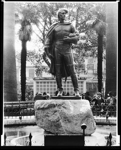 View of a statue depicting the Governor Felipe de Neve, in Los Angeles Plaza, 1920-1939