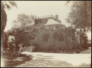 Exterior view of the vine-covered home of Caroline M. Severance