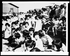 Large group of East Asian children in what appears to be a camp