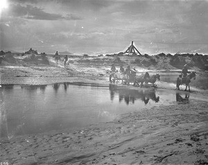 Navaho Indians crossing the Little Colorado River, ca.1900