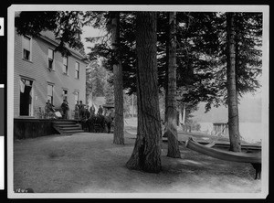 Stagecoach in front of McKinney's resort on Lake Tahoe, ca.1910