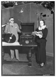 Woman recording a "talking book" with J. Robert Atkinson