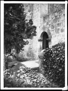 Mission Santa Barbara, showing church entrance from cemetery, 1901