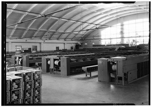 San Fernando Heights Orange Association, showing crates of citrus in a cooling room, August, 1936