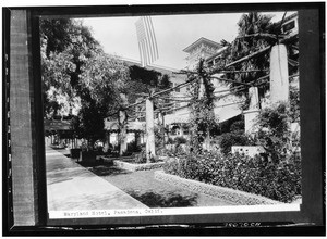 Exterior view of the Hotel Maryland in Pasadena from under the pergola