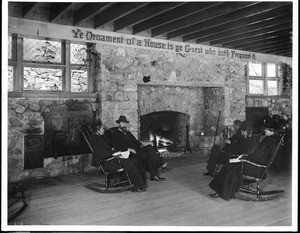 Alpine Tavern group in front of fireplace