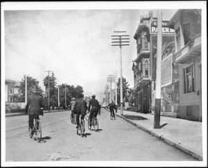 Bicyclists on Spring Street looking north near Eighth Street, ca.1899