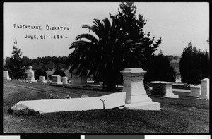 Earthquake damage in Inglewood, showing damaged tombstone in cemetery, June 1920