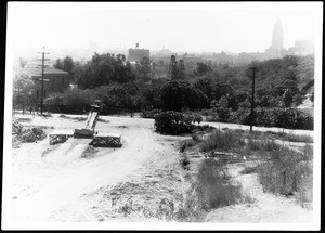 Close view of a lane of the North Figueroa Street construction site, looking south, February 1936