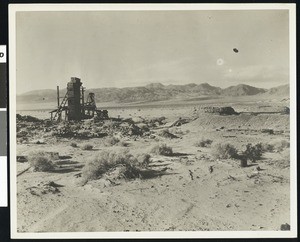 View of dilapidated wooden structure at Harmony Mill in Death Valley, ca.1900-1950