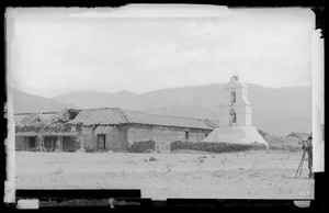 Buildings and bell tower at Mission Assistencia of San Antonio at Pala, showing the roof in disrepair, ca.1888